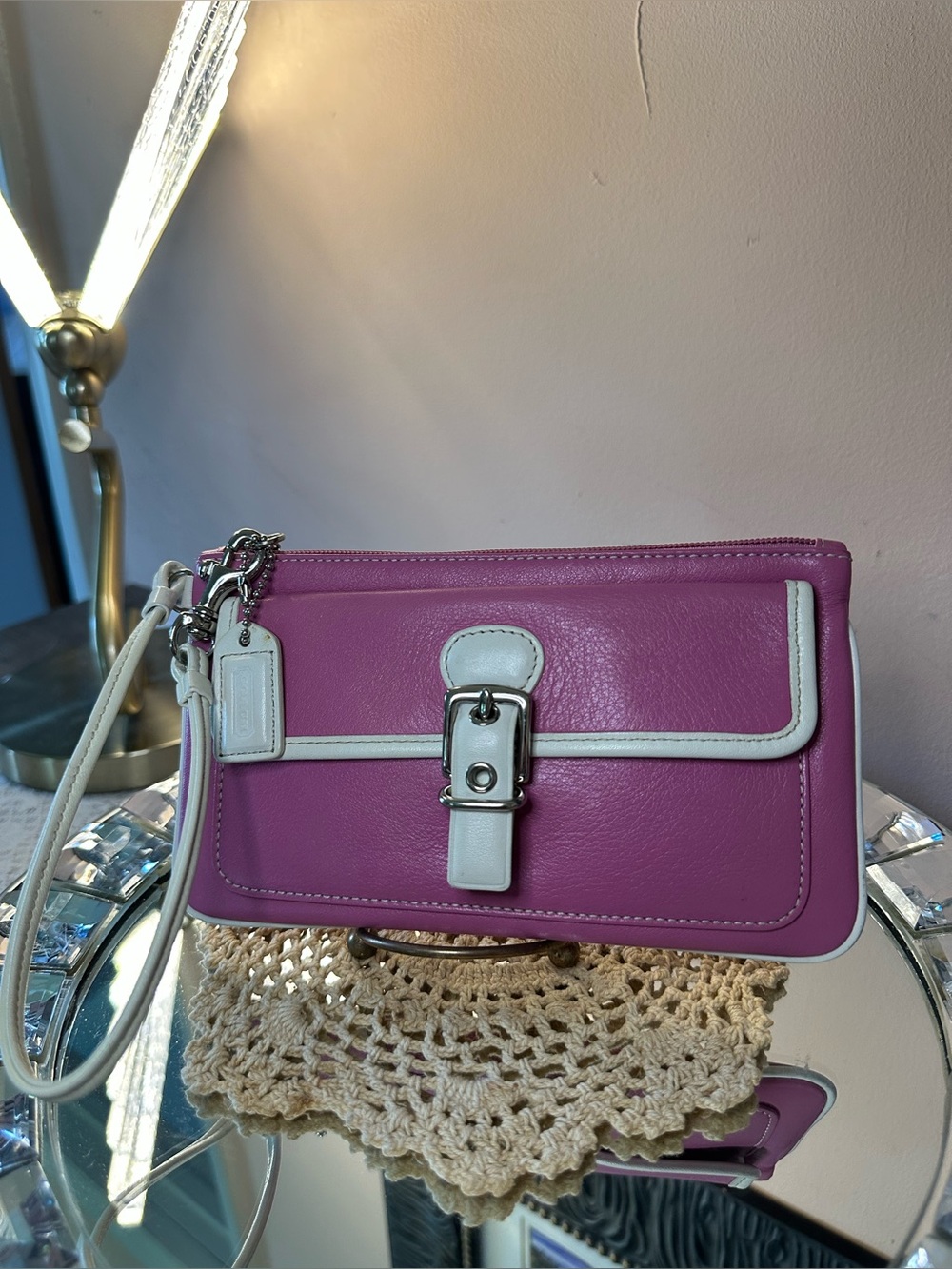 Coach vintage wristlet. Pink and white. Front pocket. In great condition.